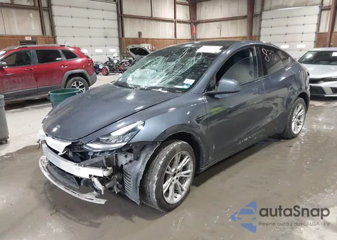 2023 Tesla Model Y Awd/Long Range Dual Motor All-Wheel Drive z USA, uszkodzony, nr VIN 7SAYGDEE4PA074009